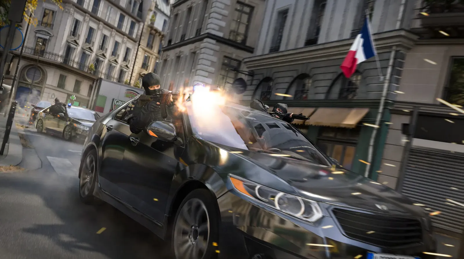 Operators firing from a speeding car in a city street, muzzle flash lighting the buildings